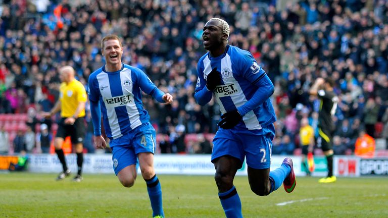 Arouna Kone scores the winning goal in Wigan's match with Norwich.