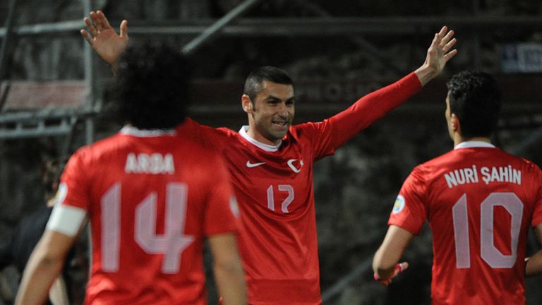Turkish forward Burak Yilmaz celebrates after scoring a goal during the World Cup 2014 qualifying football match against Andorra 