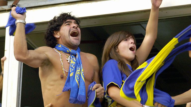 Diego Maradona and his daughter Dalma celebrate after Boca Juniors' Martin Palermo scored against River Plate 26 March, 2006.