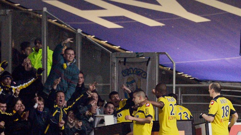 Sochaux forward Giovanni Sio and team mates celebrate against Lyon