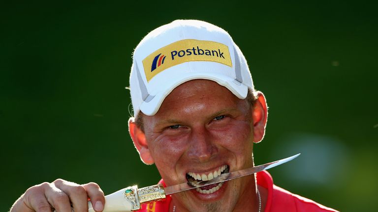 Marcel Siem of Germany poses with the trophy dagger after winning the Trophee du Hassan II 