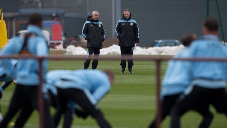 Paul Lambert and his assistant manager Ian Culverhouse watch an Aston Villa training session at the club's training ground, Bodymoor Heath.