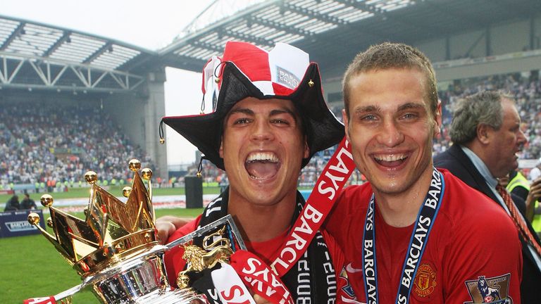 Cristiano Ronaldo and Nemanja Vidic of Manchester United celebrates with the Premier League trophy in 2008.