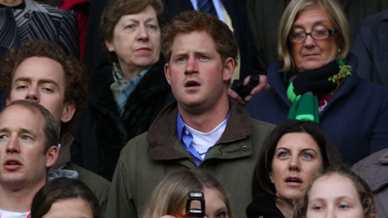 Prince Harry sings during the national anthem ahead of the RBS Six Nations match between England and Ireland at Twickenham Stadium