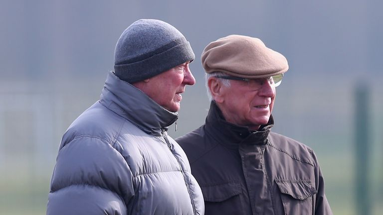 Sir Alex Ferguson and Sir Bobby Charlton during a training session at Carrington Training Ground