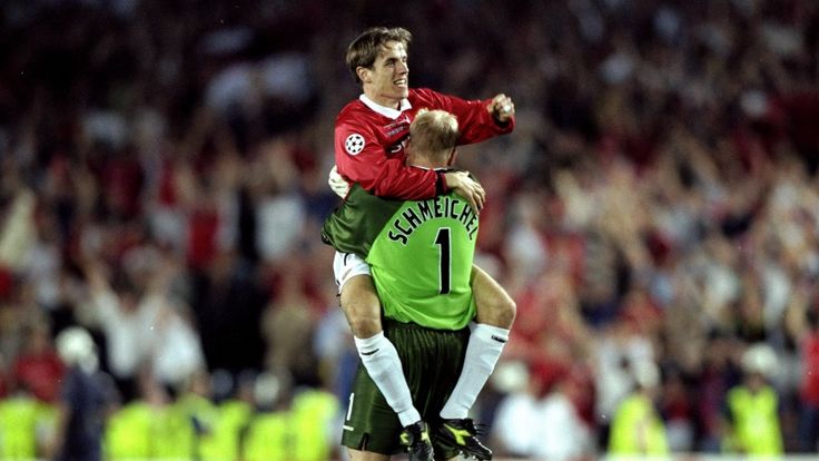 Phil Neville and Peter Schmeichel of Manchester United celebrate victory over Bayern Munich in the UEFA Champions League Final at the Nou Camp in Barcelona, Spain