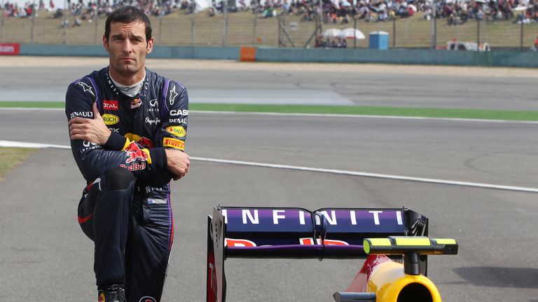 Mark Webber watches on after stopping on track