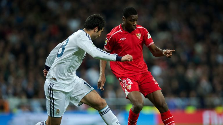 Geoffrey Kondogbia of Sevilla duels for the ball with Raul Albiol of Real Madrid during the La Liga match at the Santiago Bernabeu.