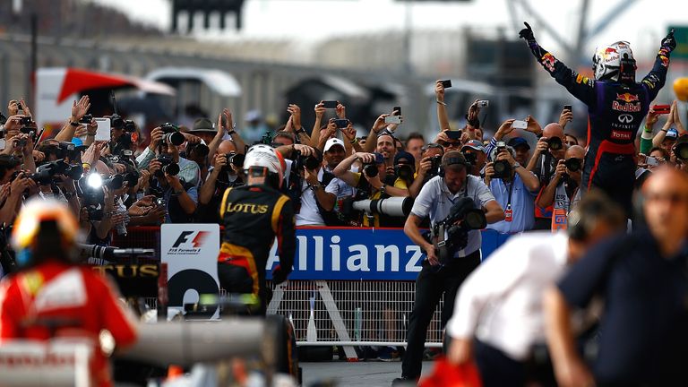 What a difference in emotion - Alonso clambers out of his Ferrari as Vettel celebrates