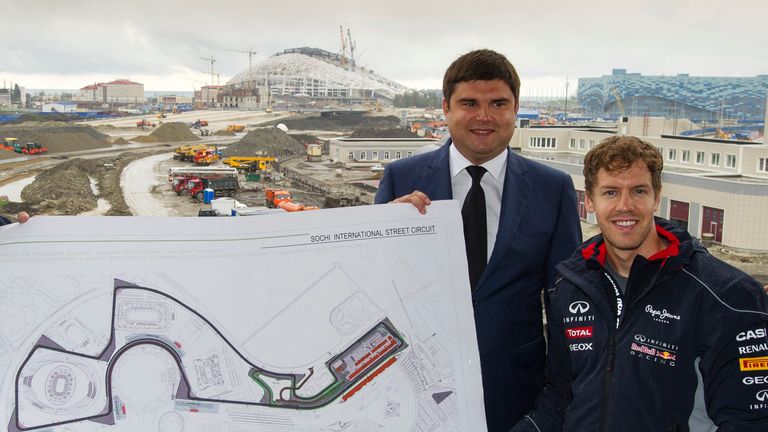 Nikolay Buturlakin, Vice Governor Krasnodar Region and Sebastian Vettel show of plans of the Sochi circuit