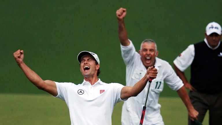 Adam Scott of Australia reacts after making a birdie putt on the Masters second sudden death playoff hole to defeat Angel Cabrera.