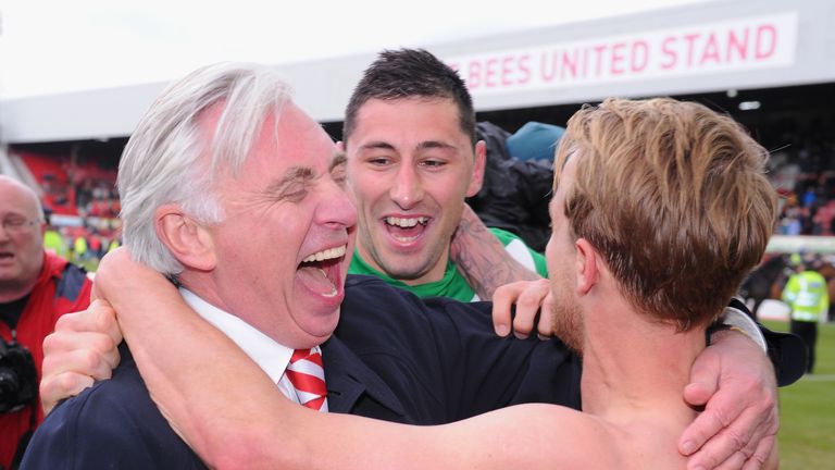 James Coppinger: Celebrates with Doncaster chairman John Ryan and Billy Paynter (centre) after Rovers beat Brentford to gain promotion