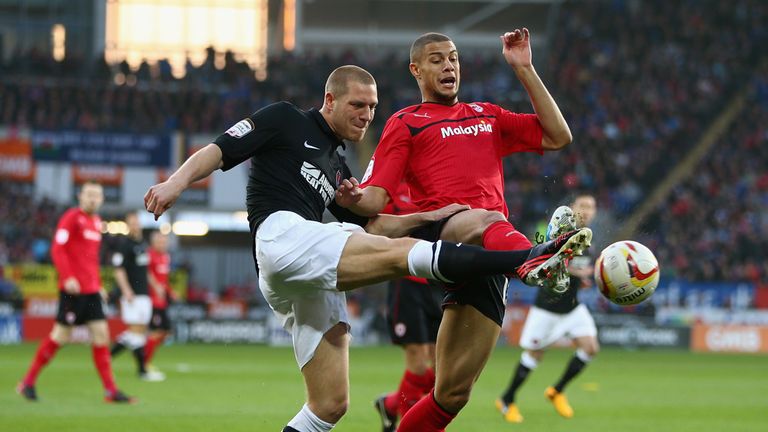 Michael Morrison of Charlton competes with Rudy Gestede of Cardiff 