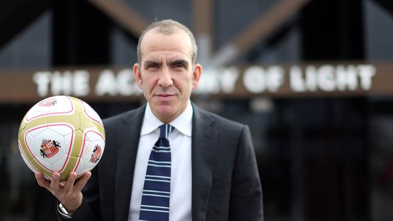 Paolo Di Canio poses with a ball after being unveiled as the new Sunderland manager.