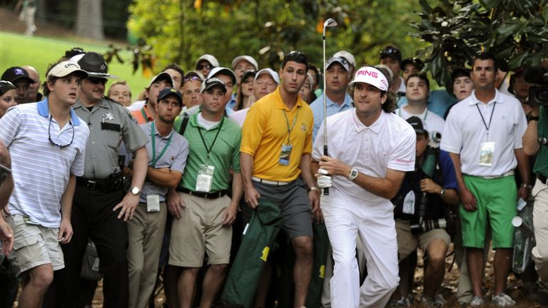 Bubba Watson of the US hits out of the woods on the 10th hole during a playoff against Louis Oosthuizen of South Africa on his way to win the 76th Masters golf tournament April 8, 2012 at the Augusta National Golf Club on  Augusta, Georgia.