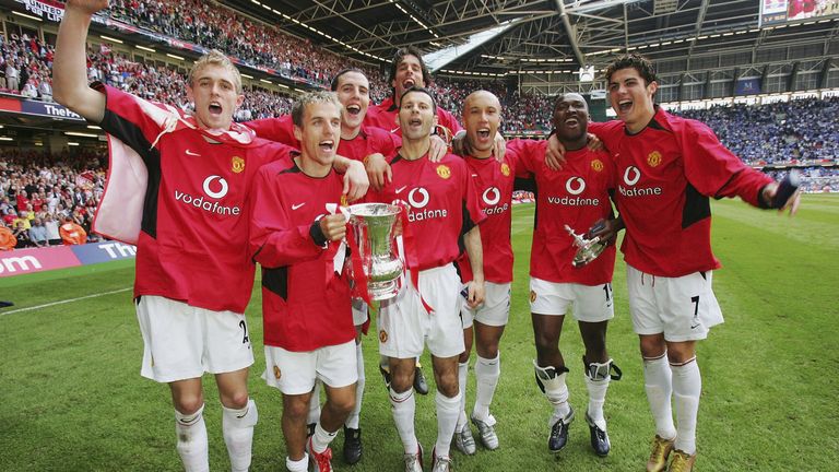 Darren Fletcher, Phil Neville, John O'Shea, Ryan Giggs, Ruud van Nistelrooy, Mikael Silvestre, Eric Djemba-Djemba and Cristiano Ronaldo of Manchester United celebrate with the FA Cup after winning the AXA FA Cup Final