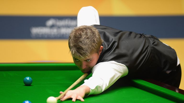 Michael White in action during his first round match against Mark Williams  during the Betfair World Snooker Championship at the Crucible