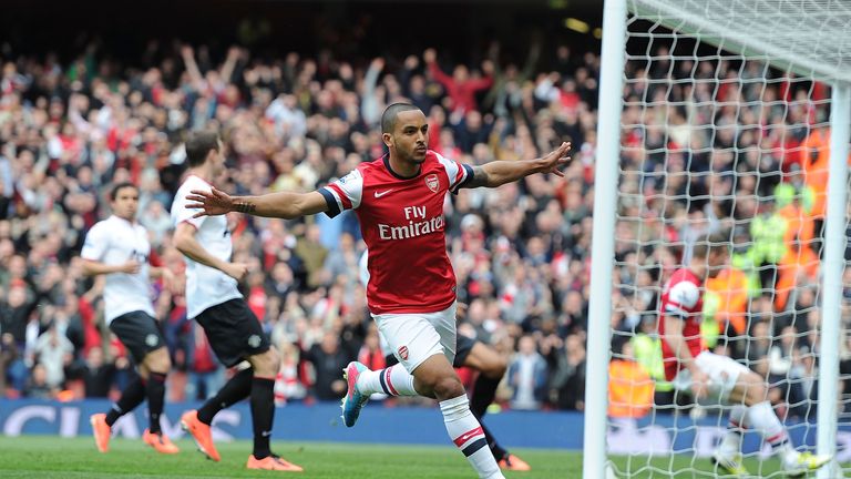 Arsenal winger Theo Walcott celebrates after scoring in the Premier League game against Manchester United at Emirates Stadium.
