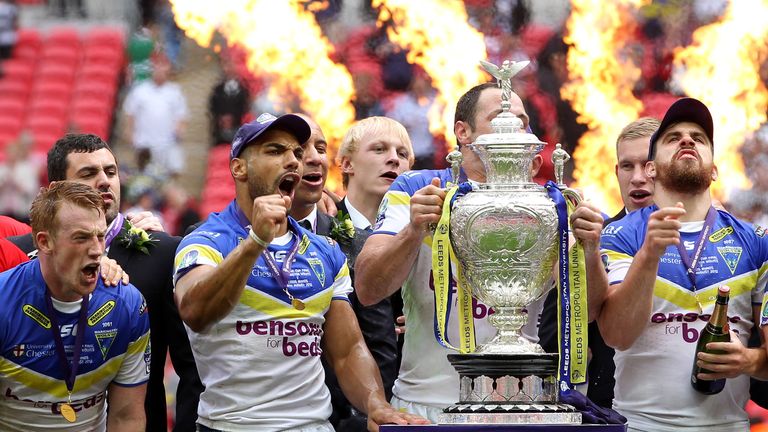 Warrington Wolves celebrate winning the Challenge Cup after beating the Leeds Rhinos at Wembley