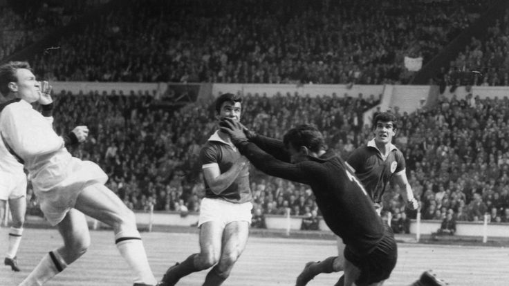 Benfica goalkeeper Costa Pereira saves from AC Milan centre forward Jose Juan Altafini during the 1963 European Cup Final at Wembley.