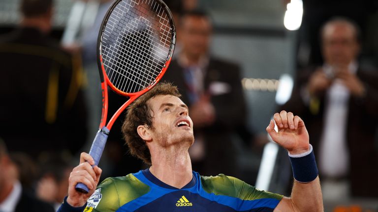 Andy Murray of Great Britain celebrates after beating Gilles Simon at the Mutua Madrid Open