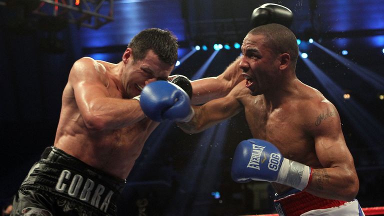 Andre Ward lands a right on Carl Froch of England during their WBA/WBC Super Middleweight Championship bout at Boardwalk Hall on December 17, 2011