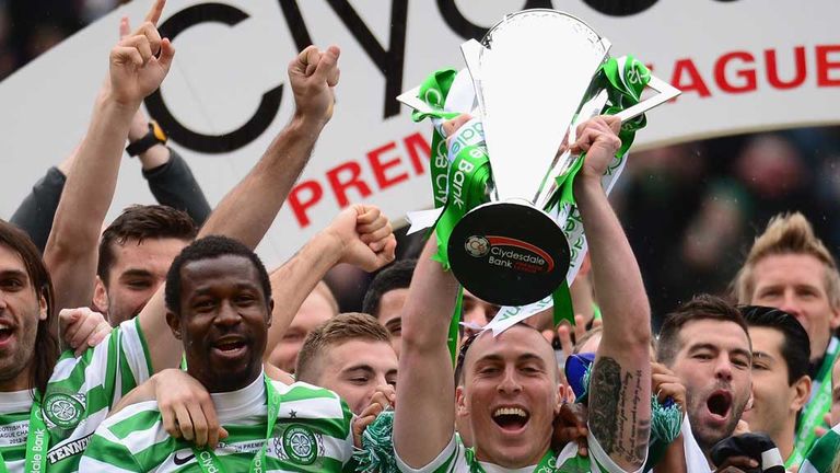 Scott Brown: Celtic captain lifts SPL trophy
