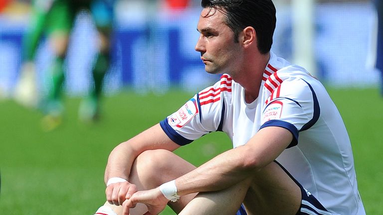 Chris Eagles sits dejected 