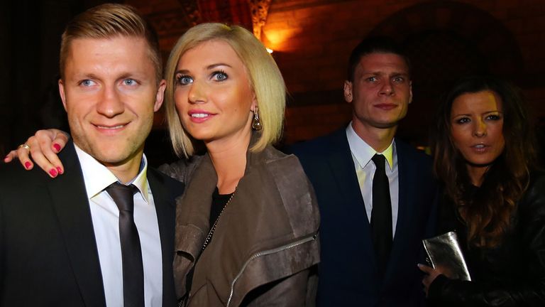 Jakub Blaszczykowski poses with his girlfriend during the Borussia Dortmund party after the Champions League final.