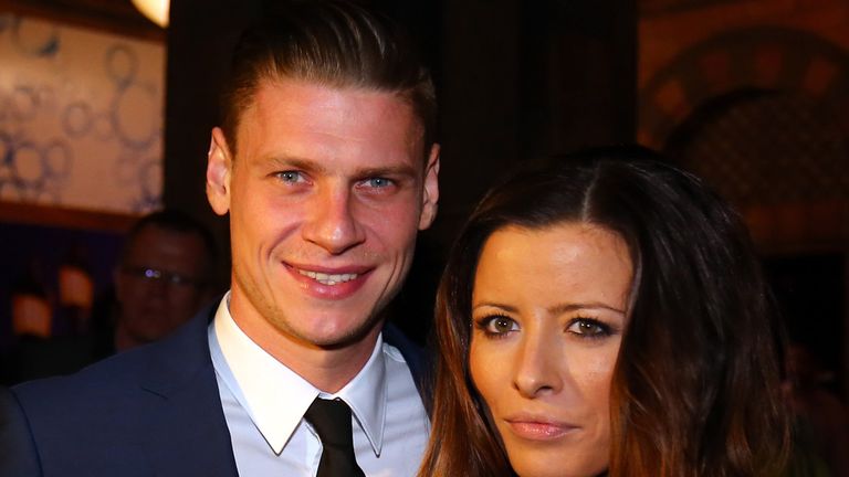 Lukasz Piszczek poses with his girlfriend during the Borussia Dortmund party after the Champions League final.