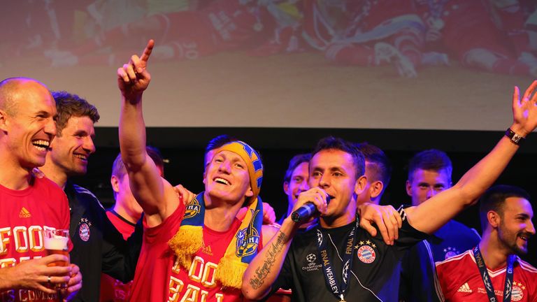 Bastian Schweinsteiger celebrates with team-mates Arjen Robben, Rafinha and Thomas Muller at the Bayern Munich Champions League Finale banquet.
