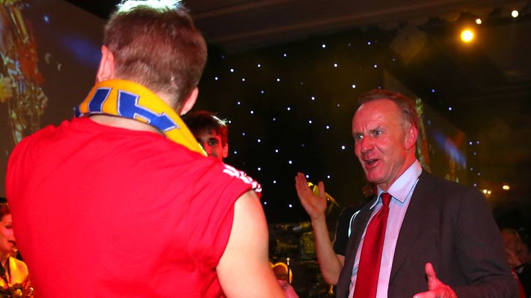 LONDON, ENGLAND - MAY 25:  Karl-Heinz Rummenigge, CEO of FC Bayern Muenchen celebrates with his player Bastian Schweinsteiger on the Bayern Muenchen Champions League Finale banquet at Grosvenor House on May 25, 2013 in London, England.  (Photo by Alexander Hassenstein/Bongarts/Getty Images)