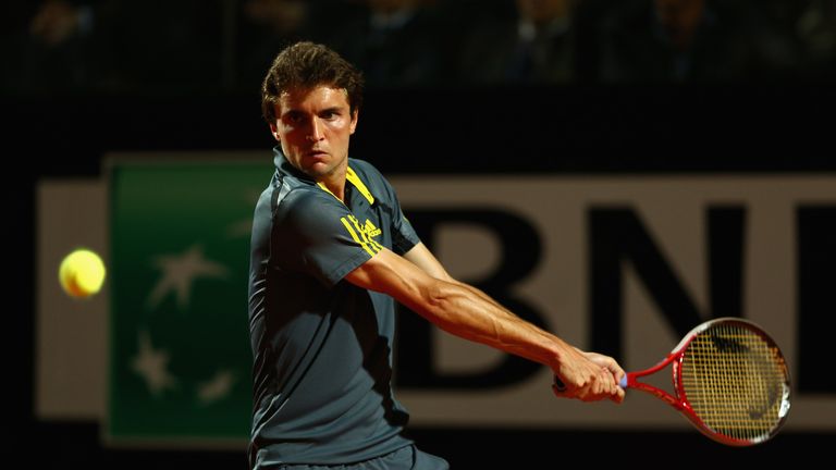 Gilles Simon in action during his third round match against Roger Federer on day five of the Internazionali BNL d'Italia