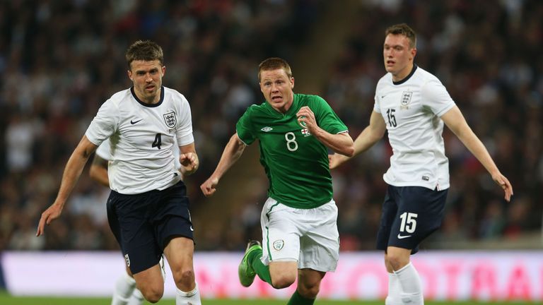 James McCarthy of the Republic of Ireland goes between Michael Carrick and Phil Jones during the friendly against England at Wembley Stadium.