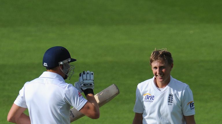 England batsman Joe Root celebrates his maiden Test hundred with Jonny Bairstow during day two of the second Test against New Zealand at Headingley