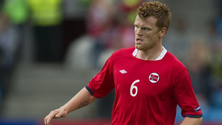 Norway's defender John Arne Riise runs with the ball during the EURO 2012 friendly match against Lithuania