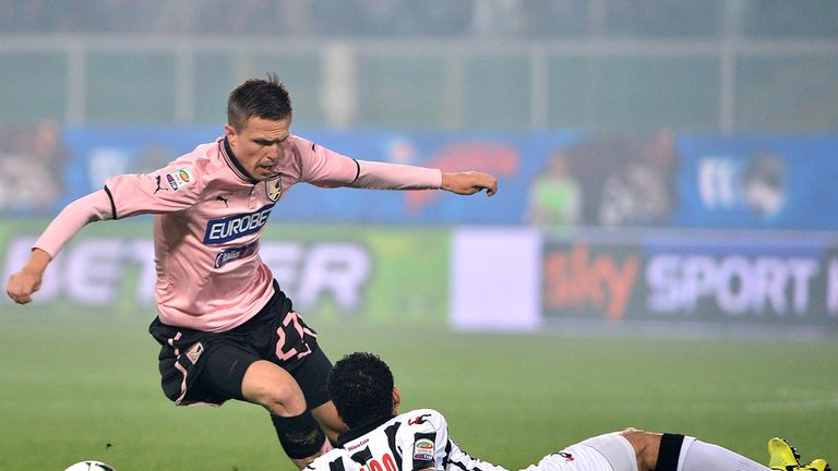 Josip Ilicic of Palermo and Marques Allan of Udinese compete for the ball 