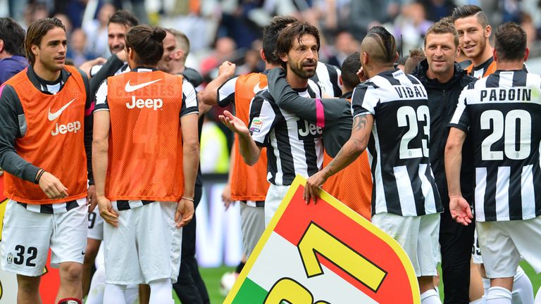 Juventus players celebrate after defeating Palermo 