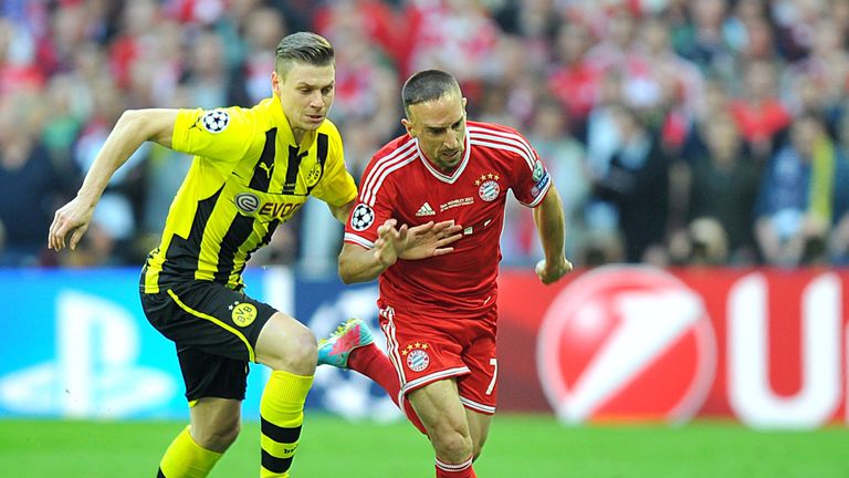 Lukasz Piszczek tried to keep up with Franck Ribery.