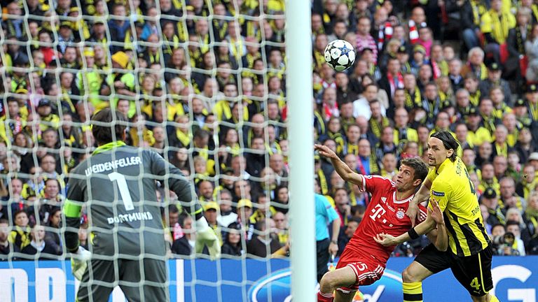 Neven Subotic and Thomas Muller battled for the ball early on.