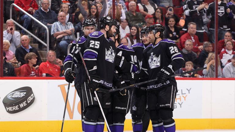 Jeff Carter #77, Dustin Penner #25 and Jarret Stoll #28 of the Los Angeles Kings during the NHL game against the Phoenix Coyotes