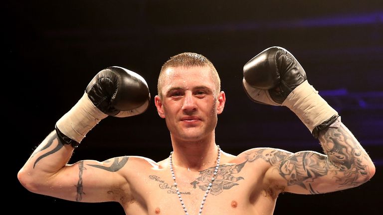 Ricky Burns celebrates his victory over Jose Gonzalez during their World WBO Lightweight Championship bout at Emirates Arena in Glasgow