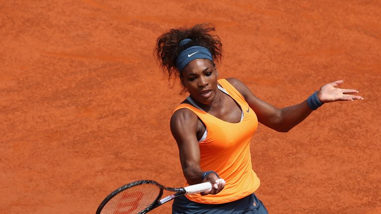Serena Williams of the USA  plays a forehand against Carla Suarez Navarro of Spain in their quarter final round match during day six of the Internazionali BNL d'Italia 2013