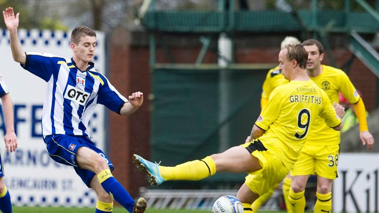 Kilmarnock's Ross Davidson challenges Leigh Griffiths