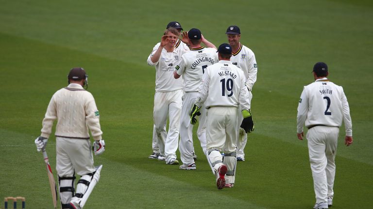Scott Borthwick of Durham celebrates with his team-mates after taking the wicket of Gareth Batty of Surrey at the Oval