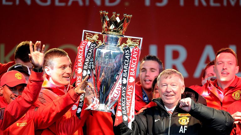 Manchester United players and manager Sir Alex Ferguson celebrate 