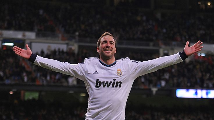 Gonzalo Higuain of Real Madrid CF celebrates after scoring Real's 4th goal during the La Liga match between Real Madrid CF and RCD Mallorca at estadio Santiago Bernabeu on March 16, 2013 in Madrid, Spain. 