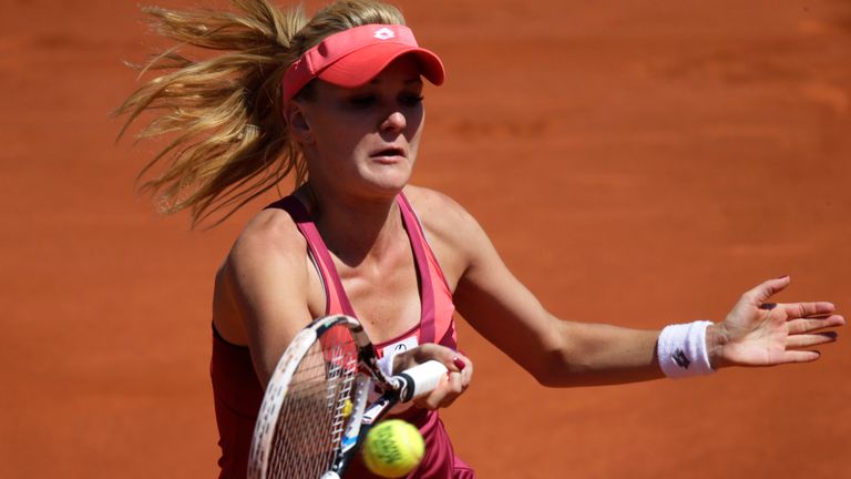 Poland's Agnieszka Radwanska hits a return to Italy's Sara Errani during their French Open quarter-final