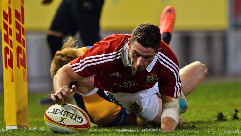 British and Irish Lions player Alex Cuthbert scores the team's first try against a Combined Country team during their tour match in Newcastle