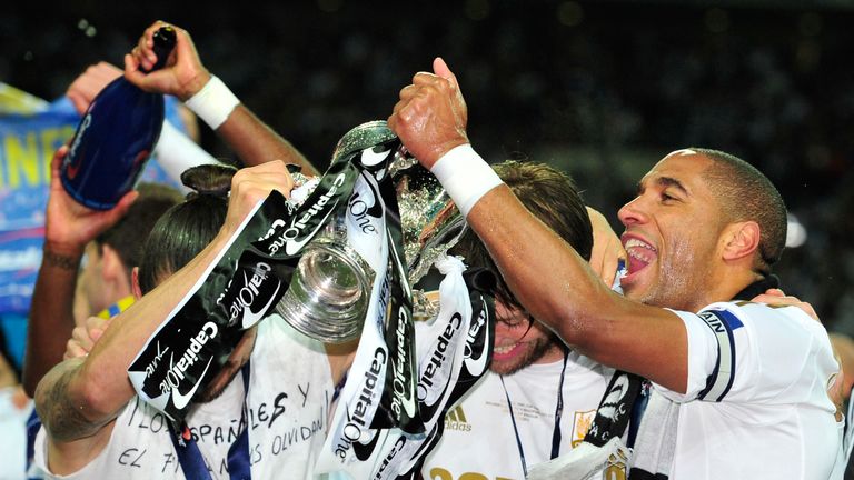 Ashley Williams and Miguel Michu celebrate with the trophy after the League Cup final between Bradford City and Swansea City at Wembley Stadium